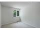 Inviting bedroom with neutral carpet and ample natural light from a large window at 5163 E 123Rd Ct, Thornton, CO 80241