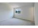 Bright bedroom features neutral carpet and a window view at 5163 E 123Rd Ct, Thornton, CO 80241