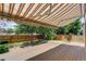 The deck has a retractable awning and plenty of space for outdoor seating and entertaining at 5163 E 123Rd Ct, Thornton, CO 80241