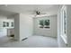 Bright dining area with a ceiling fan and a window to the backyard at 5163 E 123Rd Ct, Thornton, CO 80241