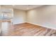 Open floorplan with kitchen and hardwood flooring at 7110 S Gaylord St # L7, Centennial, CO 80122