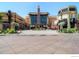 Front of a commercial center with flowers and pedestrian walkway at 7110 S Gaylord St # L7, Centennial, CO 80122