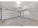 Spacious two-car garage with ample lighting and storage shelving at 3131 Vallejo St, Denver, CO 80211