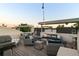 Cozy rooftop patio with comfortable seating and string lights, ideal for entertaining at 3131 Vallejo St, Denver, CO 80211