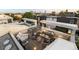 Well-appointed rooftop patio with a dining area and seating, great for city views at 3131 Vallejo St, Denver, CO 80211