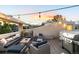 Stylish rooftop patio with grill and comfortable seating, ready for outdoor gatherings at 3131 Vallejo St, Denver, CO 80211