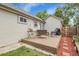 Cozy backyard deck, ideal for enjoying summer evenings with friends and Gathering at 17499 E Whitaker Dr, Aurora, CO 80015