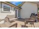 Charming backyard deck with outdoor furniture, creating a peaceful retreat at 17499 E Whitaker Dr, Aurora, CO 80015