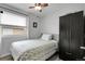 Cozy bedroom with laminate floors, lots of light, and closet for ample storage at 17499 E Whitaker Dr, Aurora, CO 80015