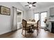 Cozy dining area featuring hardwood floors and a charming table setting at 17499 E Whitaker Dr, Aurora, CO 80015