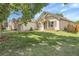 Well-manicured single Gathering home, featuring mature trees, and a lush lawn at 17499 E Whitaker Dr, Aurora, CO 80015
