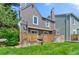 Backyard with lush lawn, wooden fence, and patio at 1035 Milo Cir # B, Lafayette, CO 80026