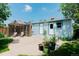 Backyard with a pergola, green grass, and a blue house at 4079 S Bannock St, Englewood, CO 80110