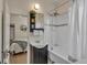 Charming bathroom featuring a clawfoot tub, tiled walls, and stylish vanity at 4079 S Bannock St, Englewood, CO 80110