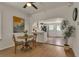 Open dining area transitioning to a well-lit kitchen, perfect for modern living and entertaining at 4079 S Bannock St, Englewood, CO 80110