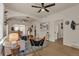 Airy living room featuring hardwood floors, neutral walls, and an open archway to other rooms at 4079 S Bannock St, Englewood, CO 80110