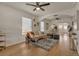 Spacious living area showcasing hardwood floors and seamless flow into the dining space at 4079 S Bannock St, Englewood, CO 80110