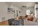 Bright living room with stylish decor, hardwood floors, and plenty of natural light at 4079 S Bannock St, Englewood, CO 80110