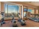 Bright gym with city views and state-of-the-art fitness equipment at 1133 14Th St # 2300, Denver, CO 80202