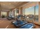 Well-equipped gym with modern treadmills and views of the city at 1133 14Th St # 2300, Denver, CO 80202