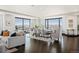 Spacious living area showcasing mountain views from the floor to ceiling windows at 1133 14Th St # 2300, Denver, CO 80202