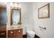 Elegant powder room with a vessel sink, granite countertop and contemporary mirror at 1133 14Th St # 2300, Denver, CO 80202