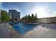 A stunning rooftop swimming pool with meticulously landscaped trees, ideal for relaxation and recreation at 1133 14Th St # 2300, Denver, CO 80202