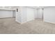 Large open unfinished basement with carpeted floor and plenty of space at 2034 Espana Way, Aurora, CO 80011