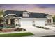 Charming single-story home with a stone facade, attached two-car garage, and well-manicured lawn at 3379 N Denali St, Aurora, CO 80019