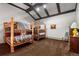 Unique bedroom features wooden bunk beds and carpeted floors at 107 N Harris St # 306, Breckenridge, CO 80424