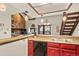 Updated kitchen featuring updated appliances, lighting, cabinetry, and breakfast bar area at 107 N Harris St # 306, Breckenridge, CO 80424