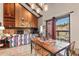 View of the open concept living area, which includes a fireplace, seating area, dining room, and kitchen at 107 N Harris St # 306, Breckenridge, CO 80424