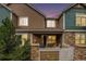Charming townhome with covered patio, offering a cozy outdoor retreat, perfect for relaxing and entertaining guests at 13275 Holly St # B, Thornton, CO 80241