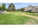 Spacious green space and trees, offering a tranquil environment for residents to enjoy at 13275 Holly St # B, Thornton, CO 80241