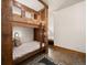 Bedroom featuring a wooden bunk bed, hardwood floors, and recessed lighting at 6016 Stone Creek Dr, Evergreen, CO 80439
