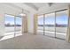 Bright living room featuring a balcony with scenic views at 130 N Pearl St # 604, Denver, CO 80203