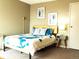 Bedroom with natural light and stylish modern furnishings at 2225 Buchtel Blvd # 202, Denver, CO 80210