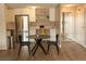 Modern dining area with black chairs at 2225 Buchtel Blvd # 202, Denver, CO 80210