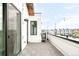 Spacious balcony featuring tile flooring and a view of the neighborhood at 3955 W 13Th Ave, Denver, CO 80204