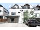 Modern home exterior with well-maintained landscaping and ample parking space at 3955 W 13Th Ave, Denver, CO 80204