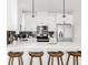 Stylish kitchen featuring white cabinetry, stainless steel appliances, and a spacious quartz countertop island at 3955 W 13Th Ave, Denver, CO 80204