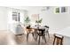 Well-lit, open-concept with a harmonious mix of seating and dining areas, offering a balanced space at 3955 W 13Th Ave, Denver, CO 80204