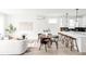 Open concept living space with a dining area and modern décor, creating an inviting atmosphere at 3955 W 13Th Ave, Denver, CO 80204