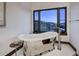 Luxurious bathroom with a freestanding chrome tub and mountain views at 2300 Boreas Pass Rd, Breckenridge, CO 80424