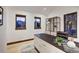 Bright home office with mountain views, built-in shelves, and modern desk at 2300 Boreas Pass Rd, Breckenridge, CO 80424