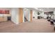 Finished basement with a wet bar, exercise equipment, and ample space for recreation at 536 S Vine St, Denver, CO 80209