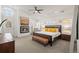 Main bedroom showcasing a fireplace, modern furniture, and lots of natural light at 536 S Vine St, Denver, CO 80209
