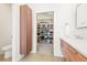 Walk-in closet features custom shelving, drawers, and cabinet space for optimal organization at 536 S Vine St, Denver, CO 80209