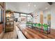 Bright dining room featuring a decorative table and chairs with a view of the kitchen at 536 S Vine St, Denver, CO 80209