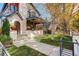 Beautiful home showcasing a landscaped yard, inviting front entrance and stylish architectural design at 536 S Vine St, Denver, CO 80209